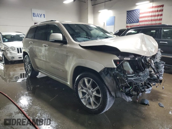 2015 Jeep Grand Cherokee Summit z VIN 1C4RJFJG1FC628532, wystawiony jako Copart lot #52546755 z przebiegiem 107 700 mil mil oraz Szkoda całkowita • Salvage title. Historia ofert i sprzedaży dostępna na DreamBid. Obrazek 4.
