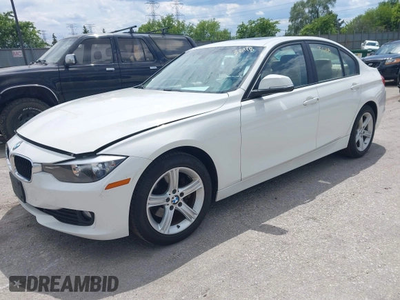 2013 BMW 3 Series 320i xDrive with VIN WBA3C3C53DF979770, listed as a IAAI auction lot 42373648 with 151,142 mi miles and . Bid and sale history available at DreamBid. Image 2.