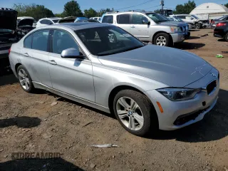 2018 BMW 3 Series with VIN WBA8F1C59JK898499, listed as a Copart auction lot 68247874 with 107,189 mi miles and Salvage title. Bid and sale history available at DreamBid. Image 4.