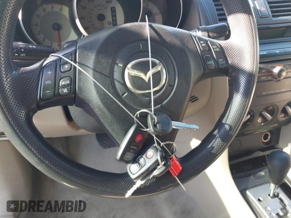 2008 Mazda 3 i Sport with VIN JM1BK12F681848304, listed as a IAAI auction lot 41481142 with 264,093 mi miles and . Bid and sale history available at DreamBid. Image 11.