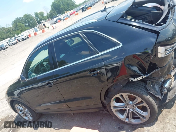 2016 Audi Q3 Premium Plus with VIN WA1EFCFS1GR022832, listed as a IAAI auction lot 42589704 with 118,915 mi miles and . Bid and sale history available at DreamBid. Image 14.