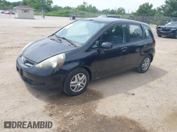 2007 Honda Fit with VIN JHMGD38437S014676, listed as a IAAI auction lot 42698451 with 288,354 mi miles and . Bid and sale history available at DreamBid. Image 2.