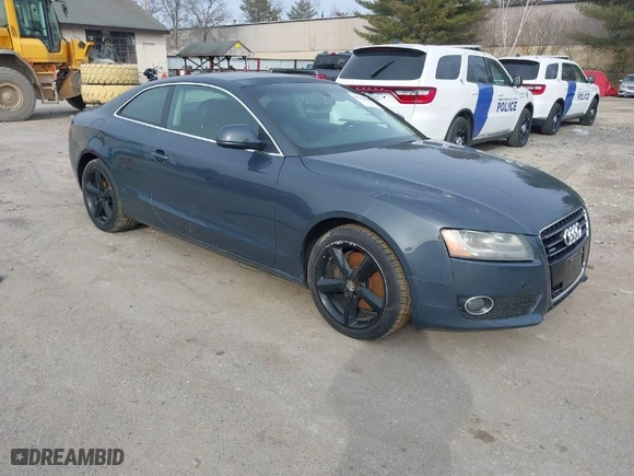 2009 Audi A5 with VIN WAUDK78T19A034813, listed as a IAAI auction lot 41786626 with 136,791 mi miles. Bid and sale history available at carsss.com. Image 3.