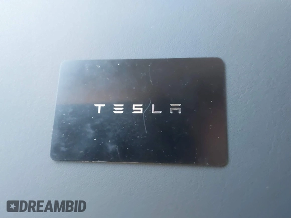 2024 Tesla Model Y with VIN 7SAYGDED8RF213927, listed as a IAAI auction lot 41386687 with 3,599 mi miles and . Bid and sale history available at DreamBid. Image 11.