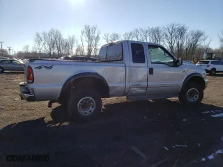 2002 Ford Super Duty F-250 XL with VIN 1FTNX21L02EA69976, listed as a Copart auction lot 86349284 with 120,693 mi miles and Salvage Title. Bid and sale history available at carsss.com. Image 3.