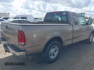 2002 Ford F-150 XL with VIN 1FTRX17222NA12740, listed as a IAAI auction lot 42546970 with 163,344 mi miles and . Bid and sale history available at DreamBid. Image 4.