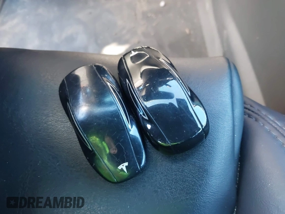 2020 Tesla Model S Long Range with VIN 5YJSA1E24LF413888, listed as a IAAI auction lot 41214903 with 42,711 mi miles and . Bid and sale history available at DreamBid. Image 11.