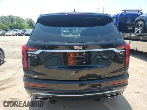 2021 Cadillac XT6 Premium Luxury with VIN 1GYKPDRS3MZ210314, listed as a Copart auction lot 58862595 with 41,307 mi miles and Salvage title. Bid and sale history available at DreamBid. Image 6.