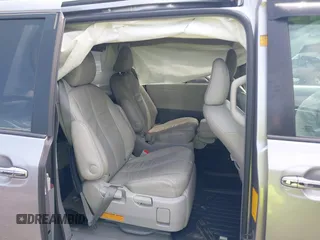 2012 Toyota Sienna XLE z VIN 5TDDK3DC5CS044692, wystawiony jako IAAI lot #42392574 z przebiegiem 185 242 mil mil oraz . Historia ofert i sprzedaży dostępna na DreamBid. Obrazek 8.