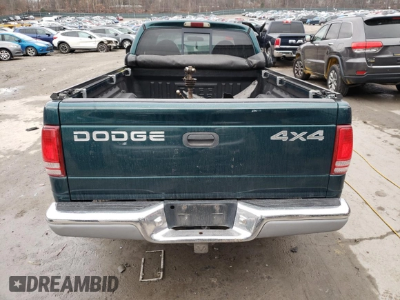 1997 Dodge Dakota z VIN 1B7GG23XXVS260724, wystawiony jako Copart lot #81040004 z przebiegiem Nie podano mil oraz Szkoda całkowita • Salvage title. Historia ofert i sprzedaży dostępna na DreamBid. Obrazek 6.