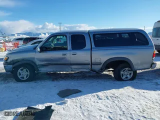 2002 Toyota Tundra SR5 with VIN 5TBBT44192S225410, listed as a IAAI auction lot 41402257 with 218,842 mi miles. Bid and sale history available at carsss.com. Image 14.