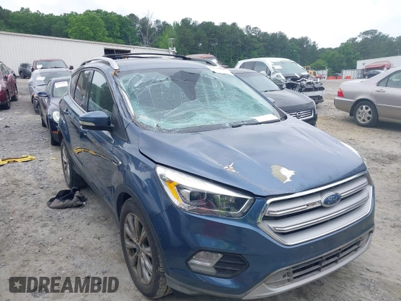 2018 Ford Escape Titanium with VIN 1FMCU0J99JUA12717, listed as a IAAI auction lot 42237509 with 123,896 mi miles and . Bid and sale history available at DreamBid. Image 13.