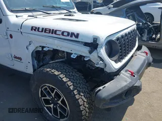 2024 Jeep Wrangler Rubicon with VIN 1C4PJXFG1RW300794, listed as a IAAI auction lot 42784578 with 22,652 mi miles and . Bid and sale history available at DreamBid. Image 6.