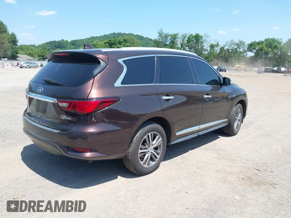 2019 Infiniti QX60 Luxe z VIN 5N1DL0MM0KC569160, wystawiony jako IAAI lot #42580368 z przebiegiem 32 923 mil mil oraz . Historia ofert i sprzedaży dostępna na DreamBid. Obrazek 4.