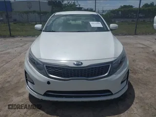 2014 Kia Optima Hybrid LX with VIN KNAGM4AD7E5075376, listed as a IAAI auction lot 42179468 with 131,920 mi miles. Bid and sale history available at carsss.com. Image 6.