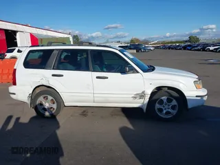2003 Subaru Forester XS with VIN JF1SG65623H742223, listed as a IAAI auction lot 41713210 with 185,779 mi miles. Bid and sale history available at carsss.com. Image 13.