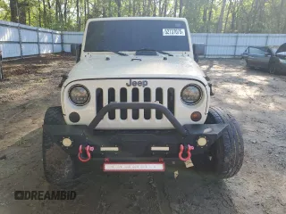 2011 Jeep Wrangler Unlimited Sport z VIN 1J4BA3H13BL592428, wystawiony jako Copart lot #52737075 z przebiegiem 246 737 mil mil oraz Szkoda całkowita • Salvage title. Historia ofert i sprzedaży dostępna na DreamBid. Obrazek 5.