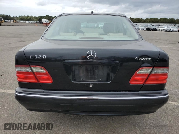 2001 Mercedes-Benz E-Class AWD with VIN WDBJF82J91X060969, listed as a Copart auction lot 71986544 with 113,694 mi miles and Salvage Title. Bid and sale history available at carsss.com. Image 6.