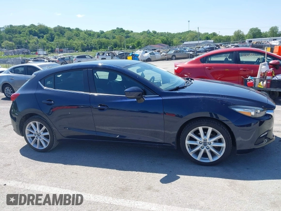 2017 Mazda 3 Touring with VIN 3MZBN1L76HM102692, listed as a IAAI auction lot 42237324 with 81,890 mi miles and . Bid and sale history available at DreamBid. Image 13.