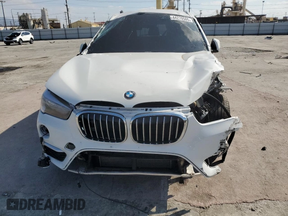 2017 BMW X1 sDrive28i with VIN WBXHU7C38H5H35352, listed as a Copart auction lot 44270505 with 68,047 mi miles and Salvage Title. Bid and sale history available at carsss.com. Image 5.