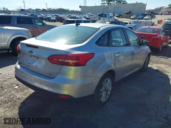 2016 Ford Focus SE with VIN 1FADP3F26GL272588, listed as a IAAI auction lot 41624534 with 149,808 mi miles. Bid and sale history available at carsss.com. Image 4.