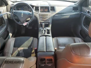 2013 Lincoln MKS с VIN 1LNHL9DK6DG602906, выставлен на аукционе Copart как лот 60415525 с пробегом 158 151 миль миль и Списание • Salvage title. История ставок и продаж доступна на DreamBid. Изображение 8.