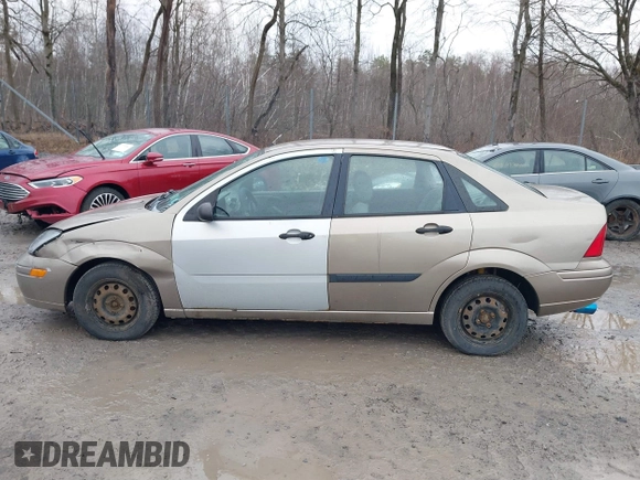 2003 Ford Focus LX with VIN 1FAFP33P33W267575, listed as a IAAI auction lot 41804406 with 106,957 mi miles and . Bid and sale history available at carsss.com. Image 14.