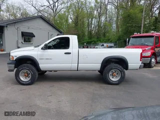2003 Dodge Ram 2500 ST with VIN 3D7KU26DX3G717885, listed as a IAAI auction lot 42044011 with 149,752 mi miles. Bid and sale history available at carsss.com. Image 14.