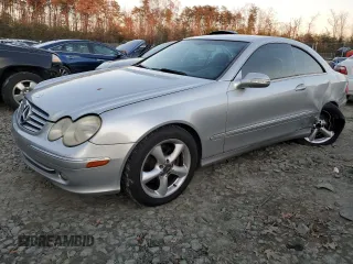 2005 Mercedes-Benz CLK-Class 3.2L with VIN WDBTJ65J95F150187, listed as a Copart auction lot 83180484 with 308,530 mi miles and Salvage Title. Bid and sale history available at carsss.com. Image 1.