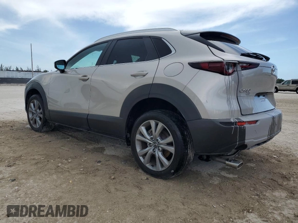 2023 Mazda CX-30 S Select z VIN 3MVDMBBM2PM530400, wystawiony jako Copart lot #58614645 z przebiegiem 26 332 mil mil oraz Szkoda całkowita • Salvage title. Historia ofert i sprzedaży dostępna na DreamBid. Obrazek 2.