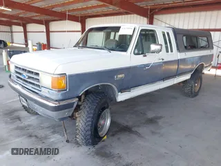 1991 Ford F-250 with VIN 1FTHX26MXMKA72774, listed as a IAAI auction lot 42121856 with 7,483 mi miles. Bid and sale history available at carsss.com. Image 2.
