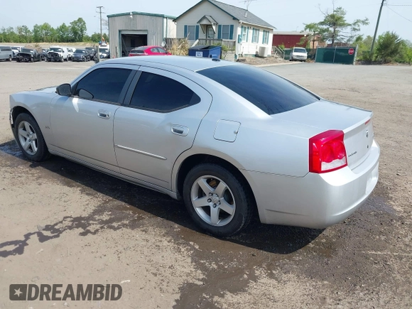 2010 Dodge Charger SXT with VIN 2B3CA3CV9AH311637, listed as a IAAI auction lot 42079657 with 187,683 mi miles. Bid and sale history available at carsss.com. Image 3.