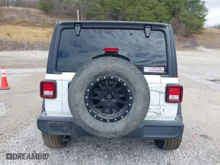 2019 Jeep Wrangler Unlimited Sport S with VIN 1C4HJXDG3KW604576, listed as a IAAI auction lot 41726805 with 89,118 mi miles. Bid and sale history available at carsss.com. Image 17.
