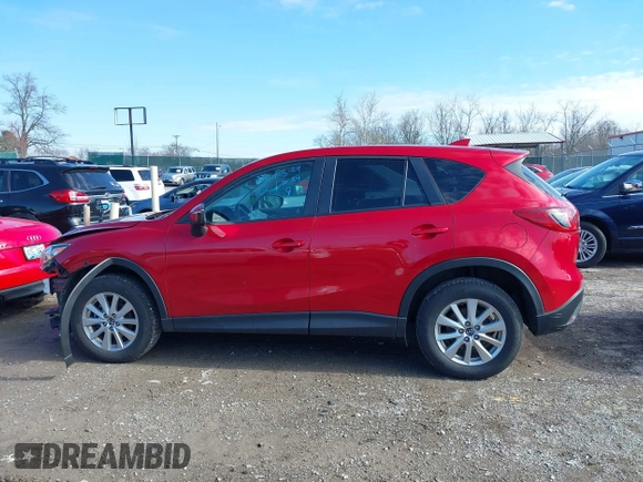 2016 Mazda CX-5 Touring with VIN JM3KE4CY5G0630438, listed as a IAAI auction lot 41877660 with 56,960 mi miles. Bid and sale history available at carsss.com. Image 15.