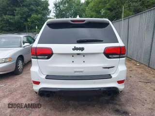 2021 Jeep Grand Cherokee Trackhawk with VIN 1C4RJFN95MC843131, listed as a IAAI auction lot 42688185 with 16,391 mi miles and . Bid and sale history available at DreamBid. Image 16.