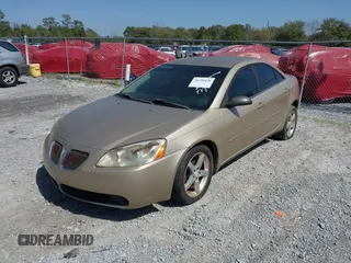 2005 Pontiac G6 with VIN 1G2ZG528754143549, listed as a IAAI auction lot 41726420 with 243,882 mi miles. Bid and sale history available at carsss.com. Image 2.