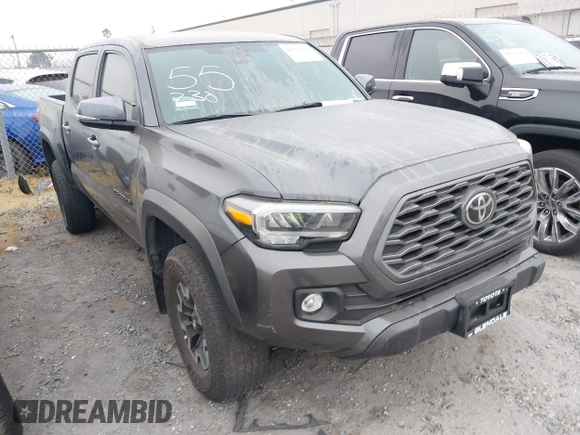 2023 Toyota Tacoma SR with VIN 3TMCZ5AN0PM635933, listed as a IAAI auction lot 42543126 with 32,960 mi miles and . Bid and sale history available at DreamBid. Image 1.