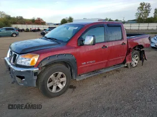2006 Nissan Titan LE z VIN 1N6BA07B86N546972, wystawiony jako Copart lot #74983924 z przebiegiem 225 495 mil mil oraz Szkody całkowita. Historia ofert i sprzedaży dostępna na DreamBid. Obrazek 1.