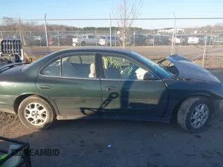 2001 Oldsmobile Intrigue GX z VIN 1G3WH52H11F127437, wystawiony jako IAAI lot #41446574 z przebiegiem Nie podano mil oraz . Historia ofert i sprzedaży dostępna na DreamBid. Obrazek 12.