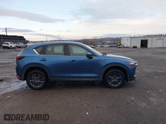 2019 Mazda CX-5 Sport with VIN JM3KFBBM5K0668678, listed as a IAAI auction lot 41811146 with 102,634 mi miles and . Bid and sale history available at DreamBid. Image 13.