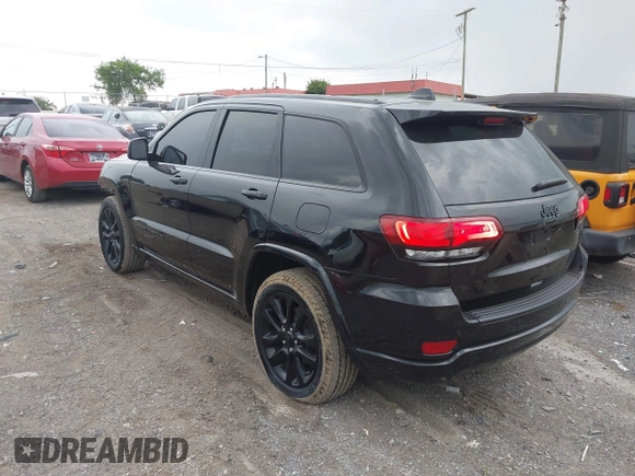 2020 Jeep Grand Cherokee Laredo E with VIN 1C4RJEAG7LC324904, listed as a IAAI auction lot 42600961 with 93,444 mi miles and . Bid and sale history available at DreamBid. Image 3.
