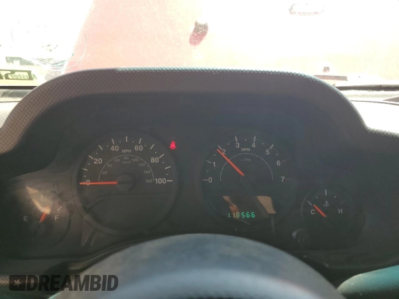 2007 Jeep Wrangler X with VIN 1J4FA241X7L111017, listed as a Copart auction lot 58871815 with 118,566 mi miles and Salvage title. Bid and sale history available at DreamBid. Image 9.