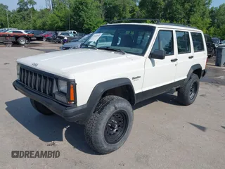 1996 Jeep Cherokee Sport z VIN 1J4FJ68S3TL226188, wystawiony jako IAAI lot #42460538 z przebiegiem 217 118 mil mil oraz . Historia ofert i sprzedaży dostępna na DreamBid. Obrazek 2.