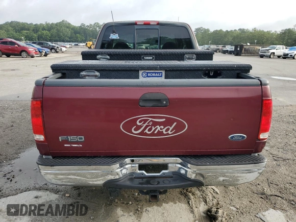 1999 Ford F-150 XL with VIN 1FTRX17LXXNA05552, listed as a Copart auction lot 60047025 with 193,122 mi miles and Salvage title. Bid and sale history available at DreamBid. Image 6.