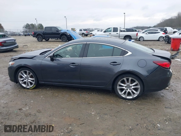 2016 Mazda Mazda6 i Touring with VIN JM1GJ1V56G1462637, listed as a IAAI auction lot 41603296 with 143,931 mi miles. Bid and sale history available at carsss.com. Image 14.