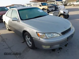 1998 Lexus ES 300 Luxury Sport Sdn with VIN JT8BF28G7W0122687, listed as a IAAI auction lot 41855378 with 216,819 mi miles. Bid and sale history available at carsss.com. Image 1.