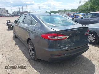 2020 Ford Fusion Titanium with VIN 3FA6P0RUXLR182120, listed as a IAAI auction lot 42351542 with 141,746 mi miles and . Bid and sale history available at DreamBid. Image 3.