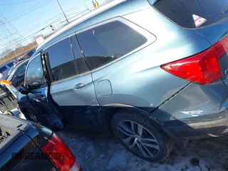 2016 Honda Pilot Elite with VIN 5FNYF6H04GB060786, listed as a IAAI auction lot 41335550 with 152,863 mi miles. Bid and sale history available at carsss.com. Image 14.