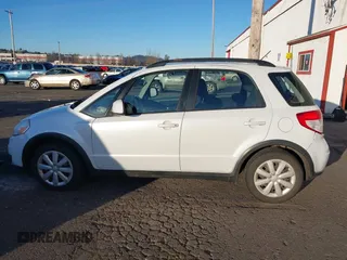 2012 Suzuki SX4 Crossover with VIN JS2YB5A37C6301245, listed as a IAAI auction lot 41548580 with 122,601 mi miles and . Bid and sale history available at DreamBid. Image 14.
