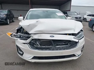 2020 Ford Fusion Titanium with VIN 3FA6P0K92LR103416, listed as a IAAI auction lot 41681810 with 54,902 mi miles and . Bid and sale history available at DreamBid. Image 6.